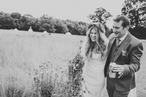 Bride and groom just married laughing woodland wedding