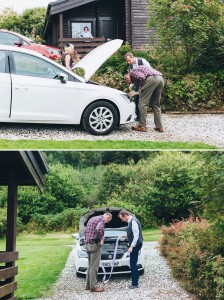 Groom and father fixing ribbon to wedding car