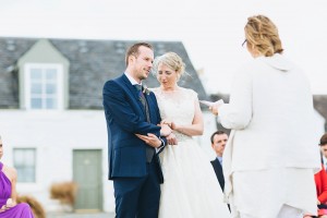 Intimate moment bride and groom outdoor wedding ceremony Hotel Eileen Iarmain Scotland