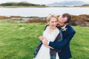 Groom kissing bride Isle of Skye wedding
