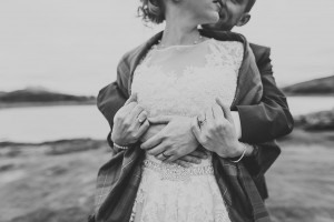 Groom hugging bride on the Isle of Skye