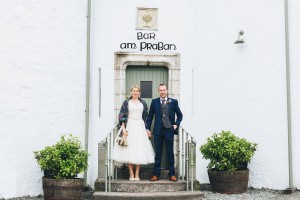 Bride and groom outside wedding venue Scotland