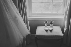 Wedding details, brides wedding shoes and dress