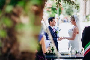 Bride and groom saying wedding vows, outdoor wedding in Villa Fondi, Italy