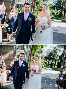 Bride and groom walking through confetti Sorrento Italy