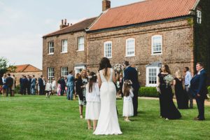 Wedding guests enjoying wedding reception Hornington Manor