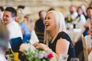 Wedding guests laughing Hornington Manor