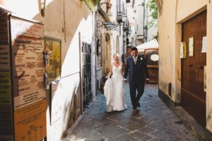 Bride and Groom walking through streets of Sorrento