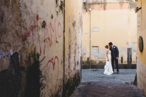 Bride and Groom Kissing in Streets of Sorrento