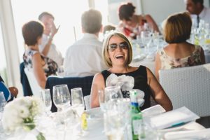 Wedding Guest Laughing during Speeches