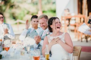 Natural photo of bride laughing